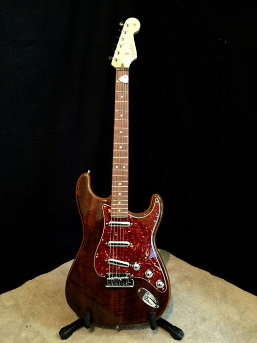 2014 Fender Custom Shop Walnut-Top Artisan Stratocaster : This was one of those guitars I stumbled across and couldn’t take eyes off of. The walnut top with the buckeye alder wood is incredible to see. I plugged it in and loved the 70’s feel the neck. The custom lipstick pickup have a 50’s snap for the lead tone with full, fat rhythm chords. Chrome hardware and ebony wood tuning knobs make this a piece of art that is a blast to play.